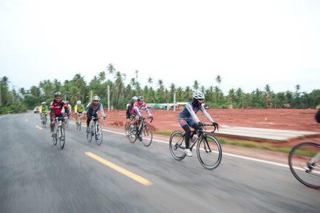 SURATTHANI, THAILAND - JULY 8: Unknown riders in action during "Suratthani bike race 2012" at Suratthani on July 8, 2012 in Suratthani, Thailand.のeditorial素材