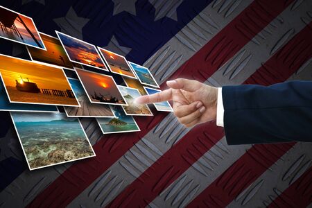 business hand selecting business icon on old united state of america flag background.の写真素材