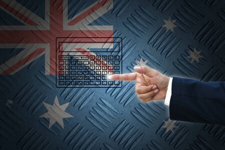 business hand selecting business icon on old Australia flag background.の写真素材