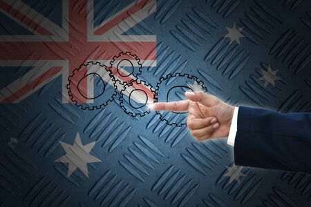 business hand selecting business icon on old Australia flag background.の写真素材