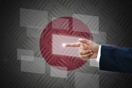 business hand selecting business icon on old Japan  flag background.の写真素材