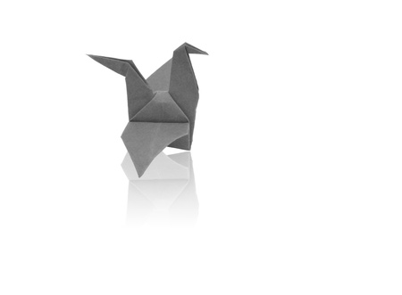 colorful paper birds with reflection on white background.の写真素材