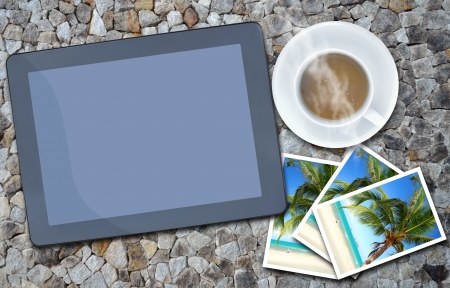 the touch screen computer  on stone backgroundの写真素材