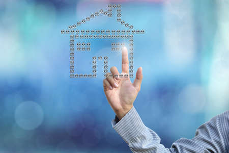 business hand selecting business icon on blue abstract background.