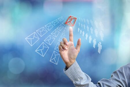 business hand selecting business icon on blue abstract background.