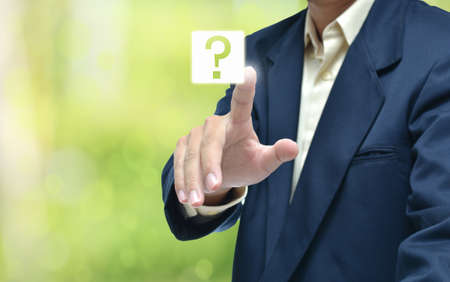 business hand selecting business icon on green abstract background.の写真素材