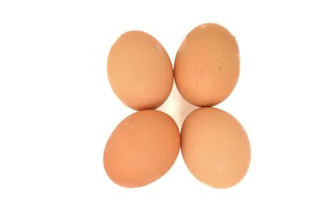 Isolated raw egg on white background.の写真素材