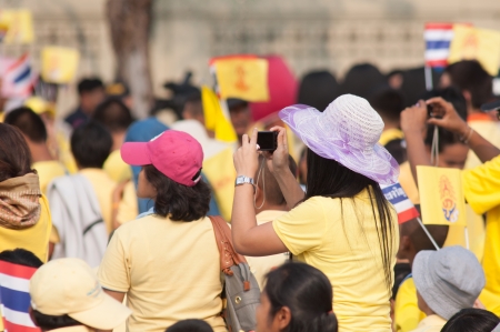 BANGKOK, THAILAND - DECEMBER 5: Almost one million of Thai poeple on Ratchadamnoen road  at H.M. the Thai Kingâs Birthday Celebration   on Dec 5, 2012 at bangkok, Thailand.のeditorial素材