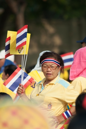 BANGKOK, THAILAND - DECEMBER 5: Almost one million of Thai poeple on Ratchadamnoen road  at H.M. the Thai Kingâs Birthday Celebration   on Dec 5, 2012 at bangkok, Thailand.のeditorial素材