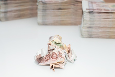 Stack of thai banknotes, one thousand bath type.