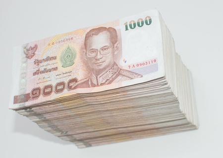 Stack of thai banknotes, one thousand bath type.の写真素材