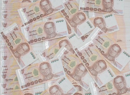 Stack of thai banknotes, one thousand bath type.の写真素材