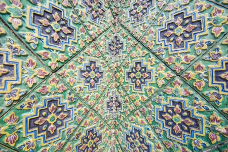 Traditional Thai art of painting on cement wall of Thai temple