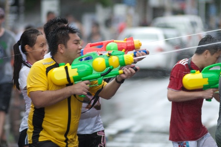 KO SAMUI, THAILAND - APRIL 13: Foreigners and Thai people enjoy splashing water together in songkran festival on April 13, 2013 in Ko Samui island, Thailand.のeditorial素材