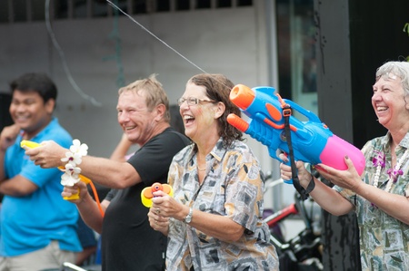 KO SAMUI, THAILAND - APRIL 13: Foreigners and Thai people enjoy splashing water together in songkran festival on April 13, 2013 in Ko Samui island, Thailand.のeditorial素材