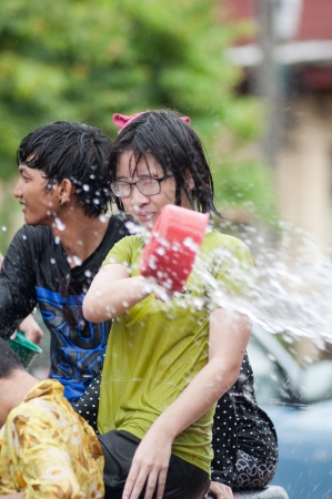 KO SAMUI, THAILAND - APRIL 13: Foreigners and Thai people enjoy splashing water together in songkran festival on April 13, 2013 in Ko Samui island, Thailand.のeditorial素材