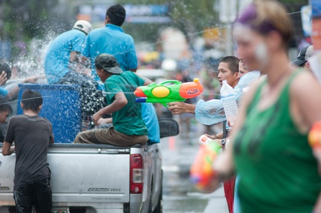 KO SAMUI, THAILAND - APRIL 13: Foreigners and Thai people enjoy splashing water together in songkran festival on April 13, 2013 in Ko Samui island, Thailand.のeditorial素材