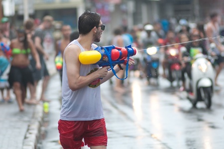 KO SAMUI, THAILAND - APRIL 13: Foreigners and Thai people enjoy splashing water together in songkran festival on April 13, 2013 in Ko Samui island, Thailand.のeditorial素材