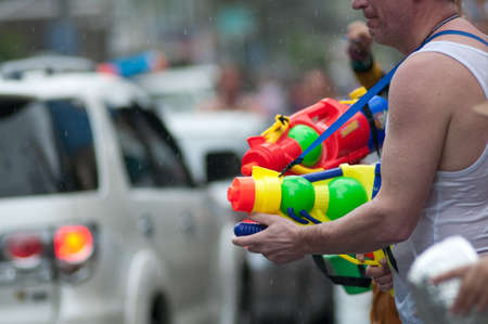 KO SAMUI, THAILAND - APRIL 13: Foreigners and Thai people enjoy splashing water together in songkran festival on April 13, 2013 in Ko Samui island, Thailand.のeditorial素材