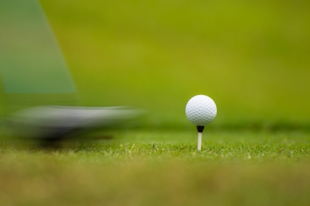 Golf ball on tee off before the game.の写真素材