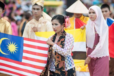 kO SAMUI,SURAT THANI - JULY 19 : Unidentified Thai students 13 - 16 years old  in ceremony uniform during sport parade  on July 19, 2012 in ko samui, Surat Thani, Thailand.のeditorial素材