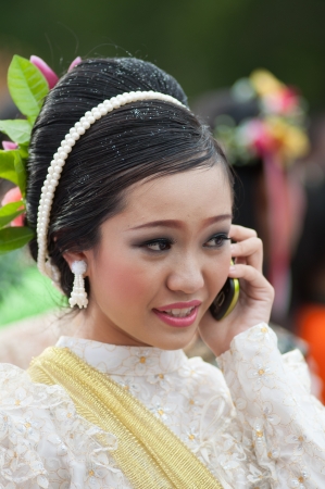 kO SAMUI,SURAT THANI - JULY 19 : Unidentified Thai students 13 - 16 years old  in ceremony uniform during sport parade  on July 19, 2012 in ko samui, Surat Thani, Thailand.のeditorial素材
