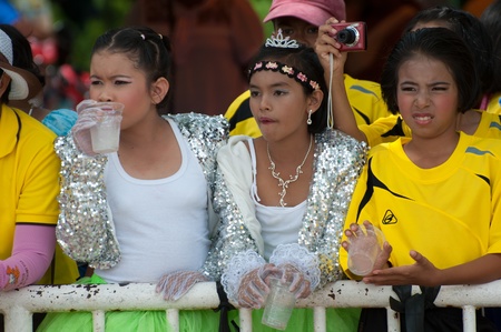 kO SAMUI,SURAT THANI - JULY 19 : Unidentified Thai students 13 - 16 years old  in ceremony uniform during sport parade  on July 19, 2012 in ko samui, Surat Thani, Thailand.のeditorial素材