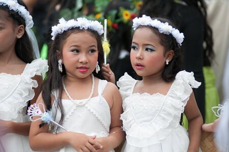 kO SAMUI,SURAT THANI - JULY 19 : Unidentified Thai students 13 - 16 years old  in ceremony uniform during sport parade  on July 19, 2012 in ko samui, Surat Thani, Thailand.のeditorial素材