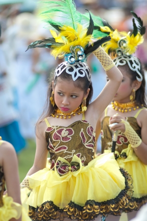 KO SAMUI,SURAT THANI - JULY 18 : Unidentified Thai students 4 - 7 years old in ceremony uniform during sport parade on July 18, 2012 in ko samui, Surat Thani, Thailand.のeditorial素材