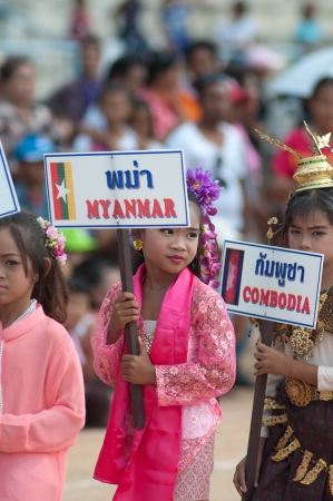 KO SAMUI,SURAT THANI - JULY 18 : Unidentified Thai students 4 - 7 years old in ceremony uniform during sport parade on July 18, 2012 in ko samui, Surat Thani, Thailand.のeditorial素材