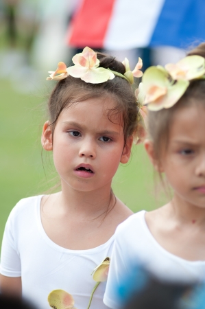 KO SAMUI,SURAT THANI - JULY 18 : Unidentified Thai students 4 - 7 years old in ceremony uniform during sport parade on July 18, 2012 in ko samui, Surat Thani, Thailand.のeditorial素材