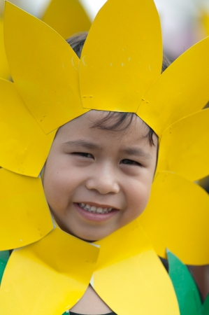 KO SAMUI,SURAT THANI - JULY 18 : Unidentified Thai students 4 - 7 years old in ceremony uniform during sport parade on July 18, 2012 in ko samui, Surat Thani, Thailand.のeditorial素材