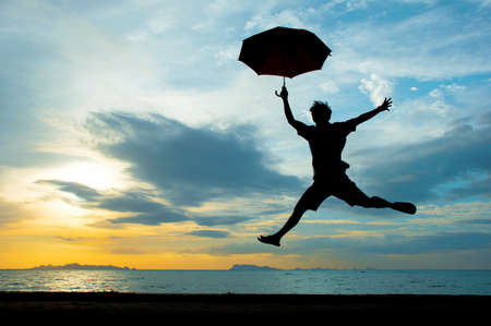 silhouette of person at dusk.の写真素材
