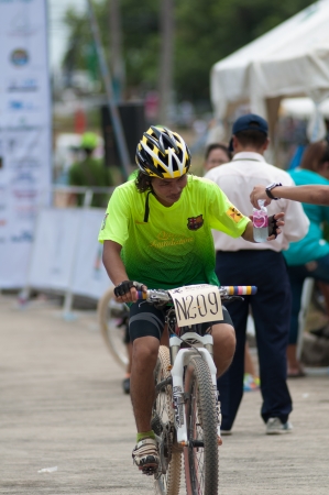 KO SAMUI, THAILAND - SEPTEMBER 8: Athlete in action during Samui MTB 2013 at ko samui city on September 8,2013 in Ko Samui island, Thailand. The third of mountain bike race in ko samui city suratthaini province Thailand.のeditorial素材