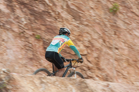 KO SAMUI, THAILAND - SEPTEMBER 8: Athlete in action during Samui MTB 2013 at ko samui city on September 8,2013 in Ko Samui island, Thailand. The third of mountain bike race in ko samui city suratthaini province Thailand.のeditorial素材