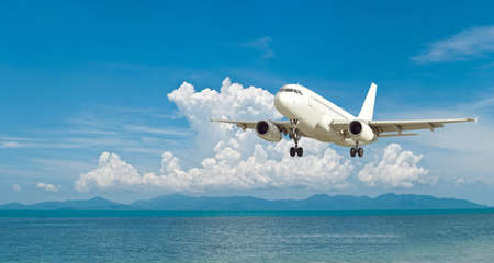 White single airplane with nature 