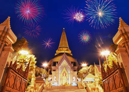 Famous thai temple with fireworks, Na khon prathom Thailand.の写真素材