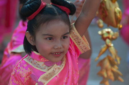 KO SAMUI, THAILAND - FEBRUARY 8: Unidentified child 5 - 10 years old in Ko samui chinese newyear festival on February 8, 2014 in Ko samui, Thailand.のeditorial素材