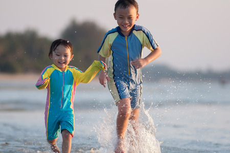 Cute asian kid with swimming suit activity.の写真素材