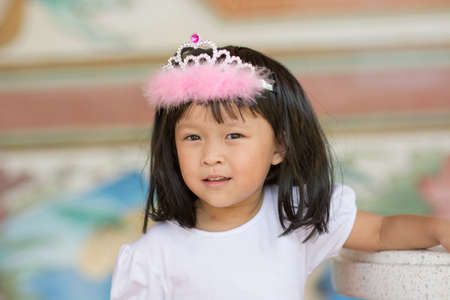 Cute asian girl portrait outdoor scene.の写真素材