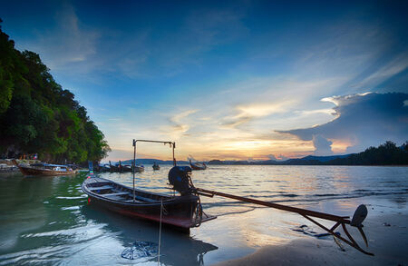 Fisherman boat on the beach with blue sky.のeditorial素材