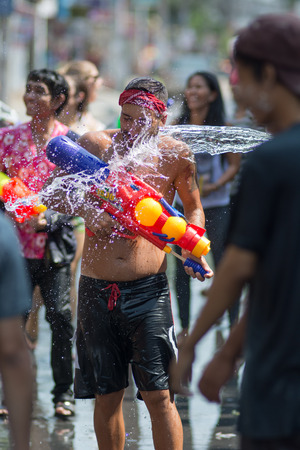 KO SAMUI, THAILAND - APRIL 13: Foreigners and Thai people enjoy splashing water together in songkran festival on April 13, 2014 in Ko Samui island, Thailand.のeditorial素材