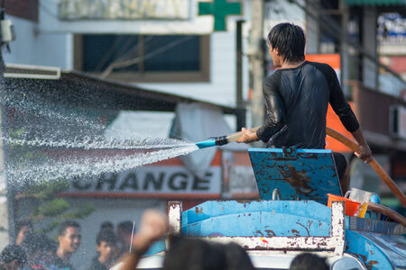 KO SAMUI, THAILAND - APRIL 13: Foreigners and Thai people enjoy splashing water together in songkran festival on April 13, 2014 in Ko Samui island, Thailand.のeditorial素材