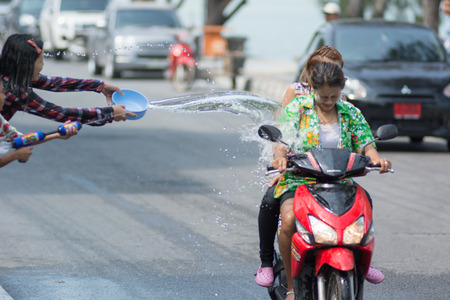 KO SAMUI, THAILAND - APRIL 13: Foreigners and Thai people enjoy splashing water together in songkran festival on April 13, 2014 in Ko Samui island, Thailand.のeditorial素材