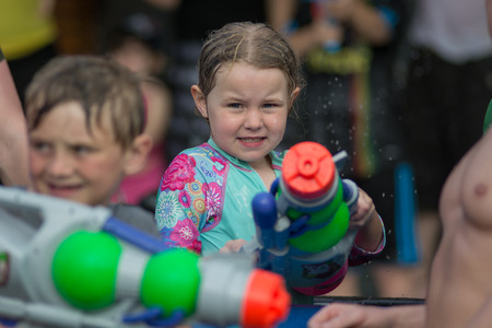 KO SAMUI, THAILAND - APRIL 13: Foreigners and Thai people enjoy splashing water together in songkran festival on April 13, 2014 in Ko Samui island, Thailand.のeditorial素材