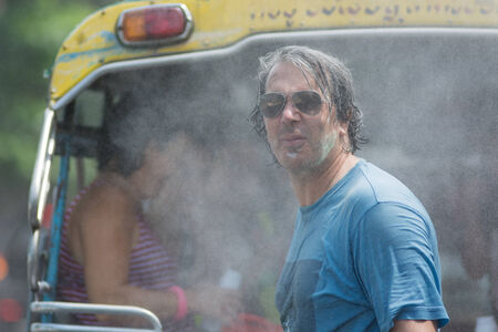 KO SAMUI, THAILAND - APRIL 13: Foreigners and Thai people enjoy splashing water together in songkran festival on April 13, 2014 in Ko Samui island, Thailand.のeditorial素材