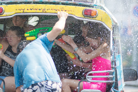 KO SAMUI, THAILAND - APRIL 13: Foreigners and Thai people enjoy splashing water together in songkran festival on April 13, 2014 in Ko Samui island, Thailand.のeditorial素材