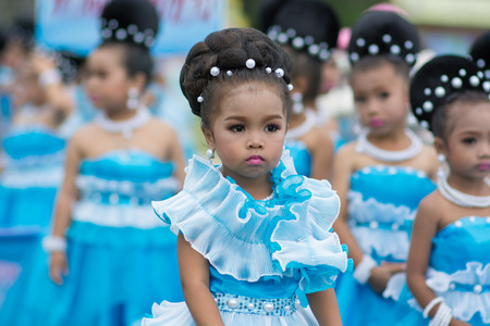 KO SAMUI,SURAT THANI - JULY 22 : Unidentified Thai students 4 - 8 years old in ceremony uniform during sport parade on July 22, 2014 in ko samui, Surat Thani, Thailand.のeditorial素材