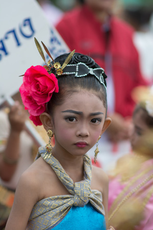 KO SAMUI,SURAT THANI - JULY 22 : Unidentified Thai students 4 - 8 years old in ceremony uniform during sport parade on July 22, 2014 in ko samui, Surat Thani, Thailand.のeditorial素材