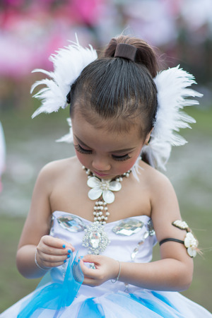 KO SAMUI,SURAT THANI - JULY 22 : Unidentified Thai students 4 - 8 years old in ceremony uniform during sport parade on July 22, 2014 in ko samui, Surat Thani, Thailand.のeditorial素材